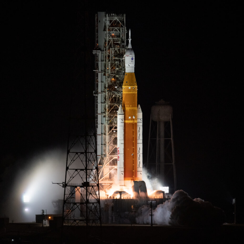 NASA SLS rocket launching Artemis mission from Kennedy Space Center Launch Complex 39B